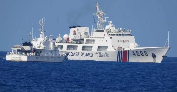 Philippines accuses China of firing water cannon at boats in South China Sea